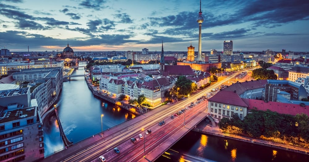 Berlin at night with high-tech city lights and open skies