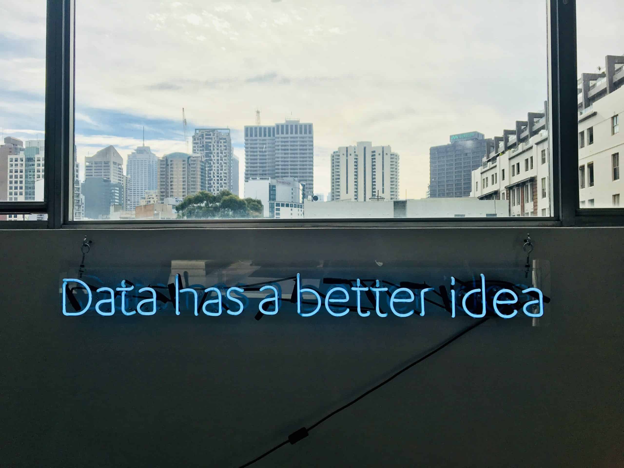 neon sign on a wall which says 'data has a better idea'