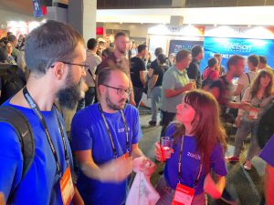 male and female software developers at codemotion conference