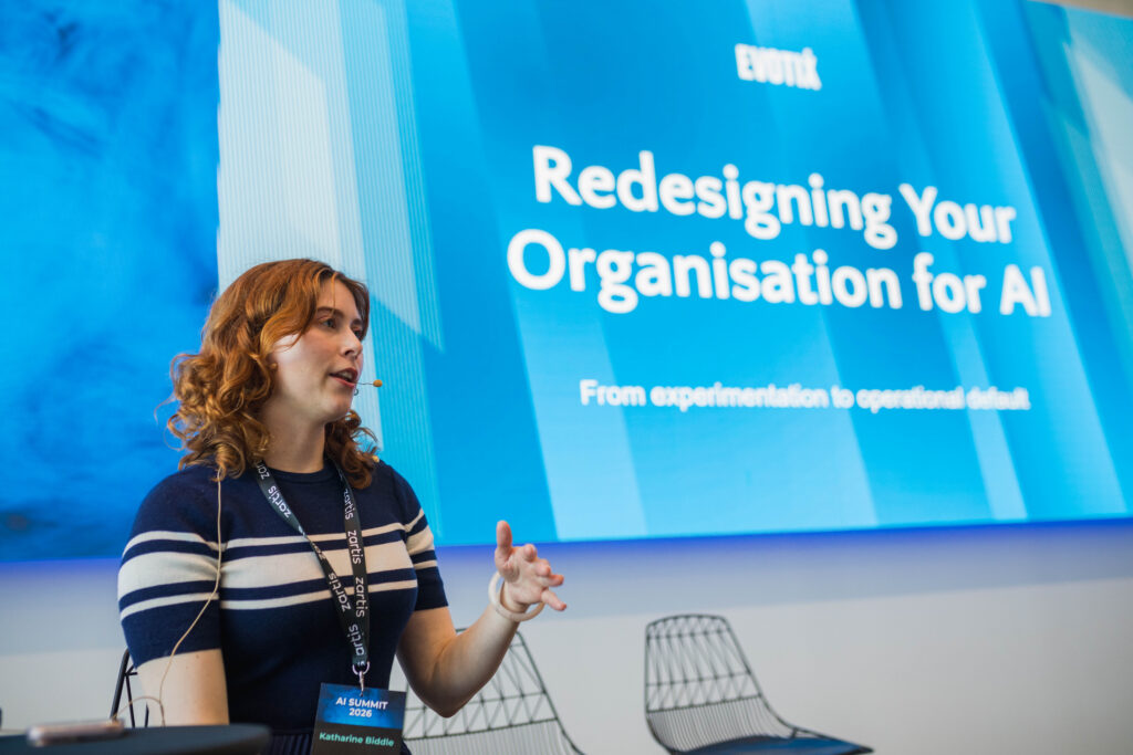Katharine Biddle giving a keynote on Redesigning Your Organisation for AI