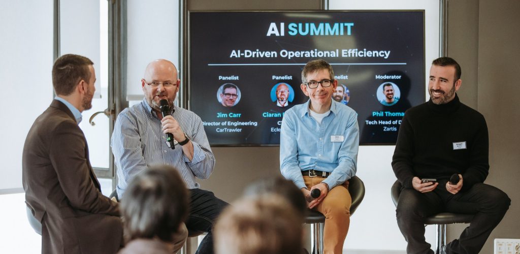 AI panel discussion with 4 males